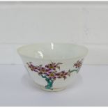 A Japanese porcelain tea bowl painted with prunus and swans pattern, bearing six character mark to
