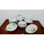 A continental porcelain dinner service, the white ground with Chrysanthemum and leaf pattern, all