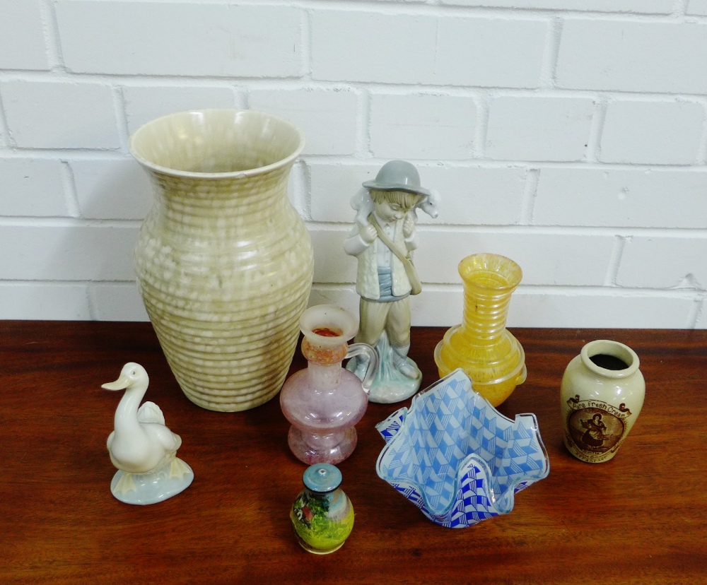 A mixed lot to include a Royal Doulton series ware pepper pot, a Nao figure and a Nao Goose,