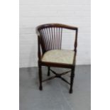 A mahogany spindle back corner chair with upholstered seat and turned supports and stretchers, 71