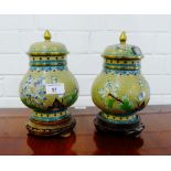 A pair of Cloisonne vase and covers on hard wood stands, 21cm high, (2)