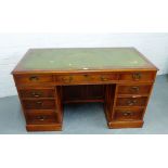 A yewwood pedestal desk with green leather skivver 78 x 138cm