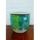 A modern Chinese jardiniere planter with leaf and butterfly pattern, 28cm high