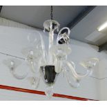 A contemporary six branch glass chandelier, drop 74cm approx