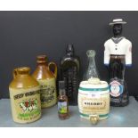 A collection of Breweriana to include a Doorly's Barbados rum decanter, a wade sherry barrel,