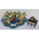 A vintage wooden painted Angel orchestra on a blue cloud shaped base, (11)