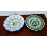 A Turkish Iznik style plate and a Faience bowl, (2)