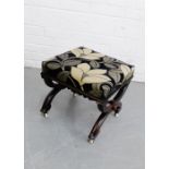 A mahogany x framed stool, with upholstered top and ceramic castors, 37 x 43cm