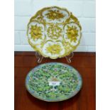 A Meissen fruit and vine embossed gilded cabinet plate with blue cross swords marks verso,