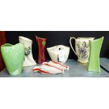 A collection of 1950's Kensington pottery to include a pair of red, white and black wall pockets,