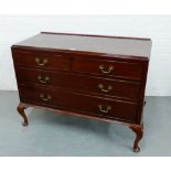 A mahogany chest, the rectangular top over two short and two long drawers, raised on cabriole