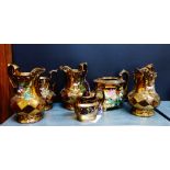 A collection of 19th century and later copper lustre wares to include jugs, milk jug and tea pot (6)