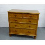 A painted pine chest, the rectangular top over two short and three long drawers, on bun feet 111 x