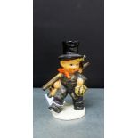 A Hummel figure of a 'Chimney Sweep', 13cm high