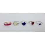 A collection of five contemporary gemset dress rings set on silver bands, UK ring size O & Q (5)