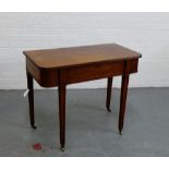 A mahogany canteen table on square tapering supports and brass castors, 90 x 73cm