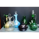 A collection of Victorian and later coloured glass and enamelled glass to include carafes, powder