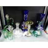 A collection of eight Victorian coloured glass and enamel painted glassware to include carafe's,