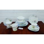 A Shelley china tea set painted with summer landscape of trees and flowers in pattern No.0148,