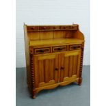 A mahogany and inlaid Falkirk kitchen dresser, with five short drawers to the ledgeback, over