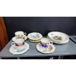 A mixed lot to include Faience plates, Meissen plate (with damages), English Staffordshire cups
