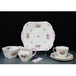 A Shelley china tea set painted with floral sprays and with pink rims comprising six cups, six