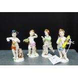 A group of four Naples porcelain cherubs, 13cm high, (4)