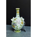 Cantagalli Majolica bottle neck jar with applied loop handle lugs to the shoulders, painted with