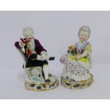 A pair of 19th century Meissen porcelain male and female figures, each modelled seated, the gent