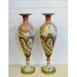 A pair of brass mounted vases of tapering baluster form painted with flowers to a crackle ground,