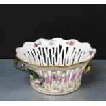 A 19th century Copenhagen pierced floral basket with gilt edged rim and twist handles to side,