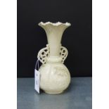 A Belleek porcelain floral encrusted vase, with early black printed back stamp, 23cm high
