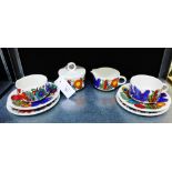 A collection of Villeroy & Boch 'Acapulco' patterned pottery to include two cups, two saucers, two
