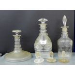 A group of three 19th century decanters to include two triple ring necked examples and a flat bottom