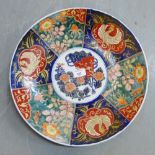 A modern Japanese charger painted with Chrysanthemums and other flowers, diameter 41cm