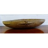 A Papuan Kamana Sagos wooden bowl of elongated form with carved detail to sides, 65cm long x 27cm