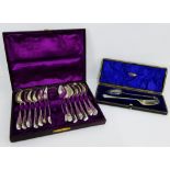 A cased set of twelve Victorian silver teaspoons together with matching sugar tongs, with makers