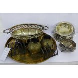 A mixed lot to include two early 20th century silver toastracks, Epns wine coaster and basket,