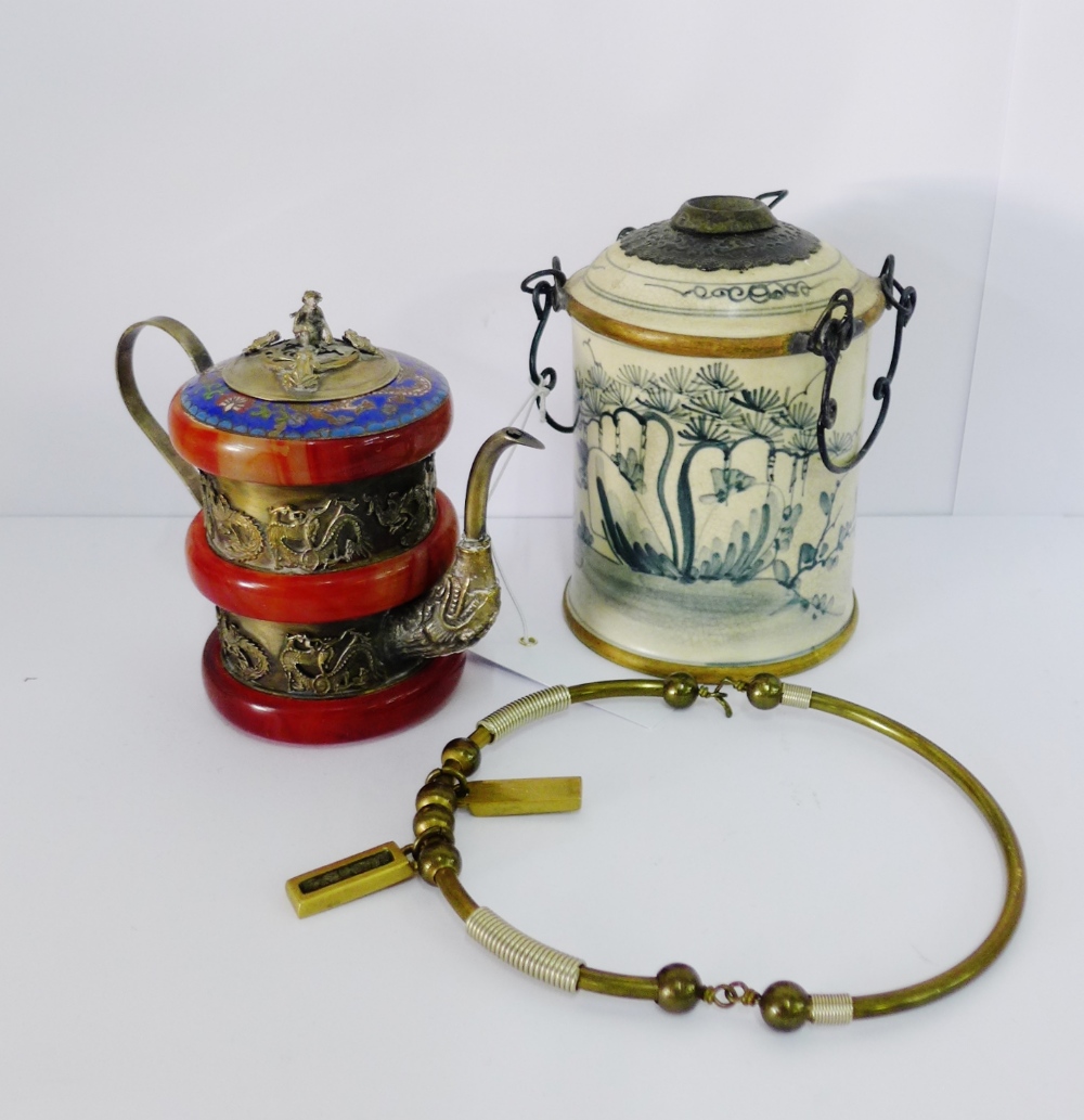 Cambodian blue and white opium pipe, together with an Eastern white metal wine pot and a brass