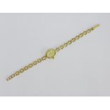 Ladies 9 carat gold cased wristwatch on 9 carat gold bracelet strap