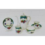 A Crown Staffordshire fruit patterned coffee set comprising six cups, six saucers, cream jug,