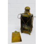 A French brass and glass panelled lantern lamp with makers mark 'St Ouen' model 1925, has a carry