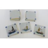 A collection of modern Delft tiles to include nine blue and white and three further decorated with