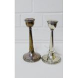 A pair of George V silver candlesticks of plain tapering form, makers mark for Napper & Davenport,