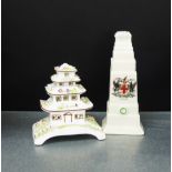 A Coalport fine bone china Pagoda house, together with a crested ware model of the Cenotaph, tallest