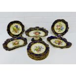 A 19th century English fruit painted porcelain dessert service, comprising twelve plates, four