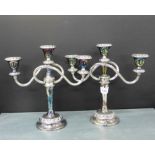 A pair of Epns three-branch candelabra, 26cm high, (2)