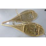 Two pairs of vintage snow shoes, (2)