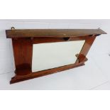 An Arts & Crafts oak overmantle mirror, 71 x 113cm