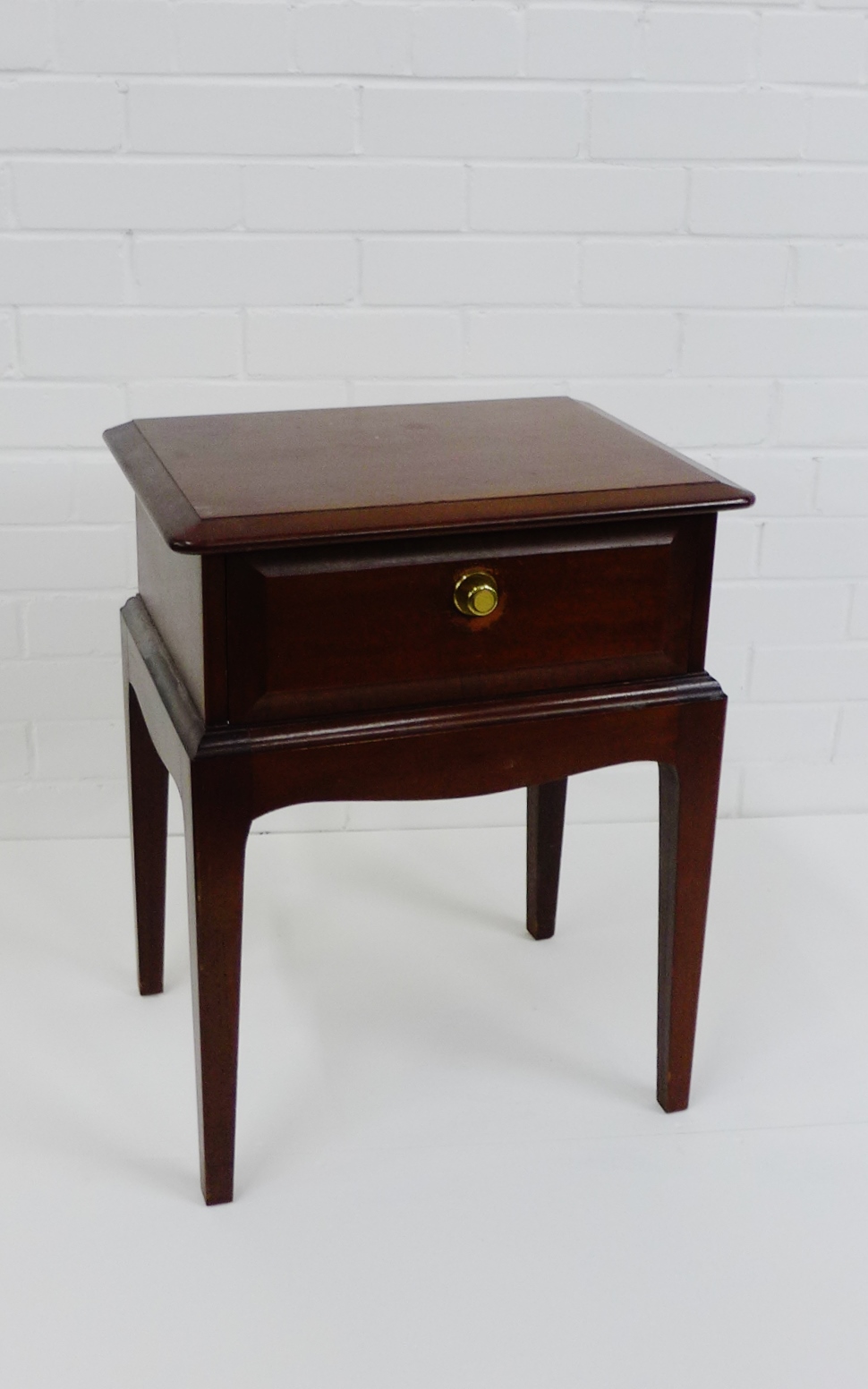 A Stag bedside table with single drawer, 56 x 45cm